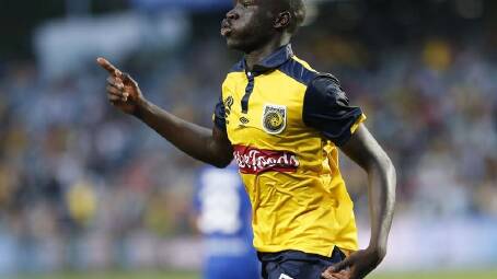 Alou Kuol has heaped praise on the coach who's guided the Central Coast Mariners to the premiership. (Darren Pateman/AAP PHOTOS)