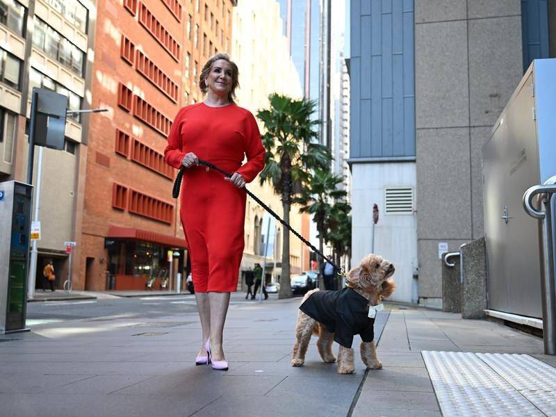 Gina Edwards has been awarded $150,000 for Nine reports of a custody dispute over cavoodle Oscar. (Dean Lewins/AAP PHOTOS)
