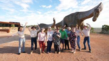 Palaeontologists at Winton's Australian Age of Dinosaurs celebrate the 12 new sauropod specimens described. Picture supplied. 