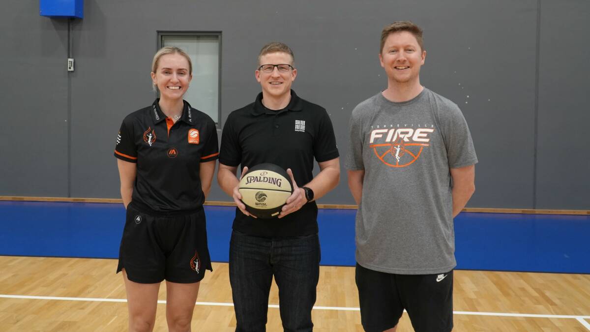 Townsville Fire player Courtney Woods, South32 Cannington Vice President Operations Joe Russell and Townsville Fire Head Coach Shannon Seebohm. Picture Supplied.