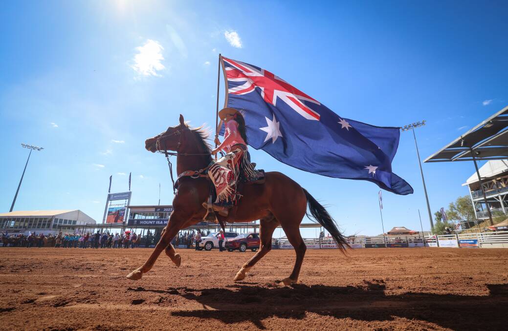 Warwick Cowgirl Maddie Gray carryied the flag at Mount Isa Rodeo in 2023. Picture: Supplied