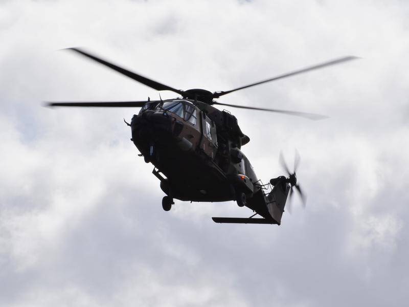 A 65-year-old helicopter pilot has died in a crash at Bingegang, west of Rockhampton. (Murray McCloskey/AAP PHOTOS)