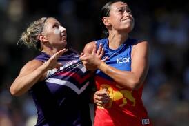 Former Dockers player Janelle Cuthbertson (left) is Port Adelaide's new AFLW captain. (Richard Wainwright/AAP PHOTOS)