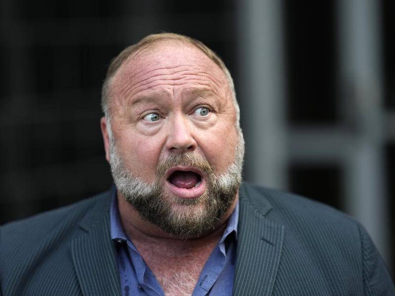 A judge has appointed a trustee to liquidate the personal assets of conspiracy theorist Alex Jones. (AP PHOTO)