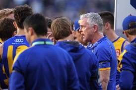West Coast coach Adam Simpson is standing firm despite talk of unrest among some of his players. (Richard Wainwright/AAP PHOTOS)