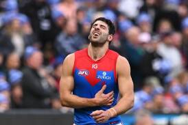 Melbourne star Christian Petracca when seriously hurt in round 13. (James Ross/AAP PHOTOS)