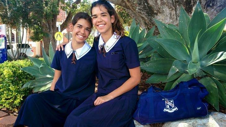 Identical twins Jadalyn and Jazleen De Busch will study at St Margaret's Anglican Girls School in Ascot this year along with seven other sets of twins. Photo: Jorge Branco