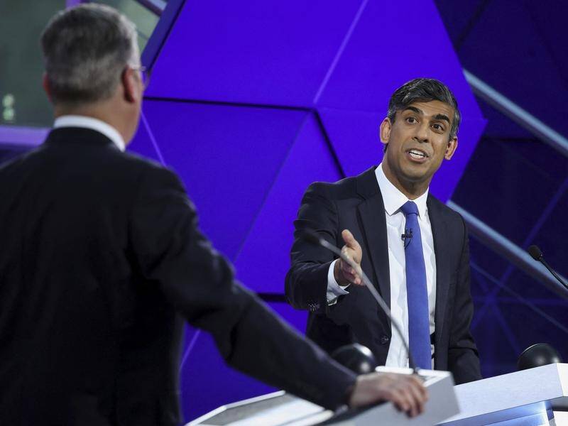 Rishi Sunak and Labour's Keir Starmer in a heated exchange during the UK election TV debate. (AP PHOTO)
