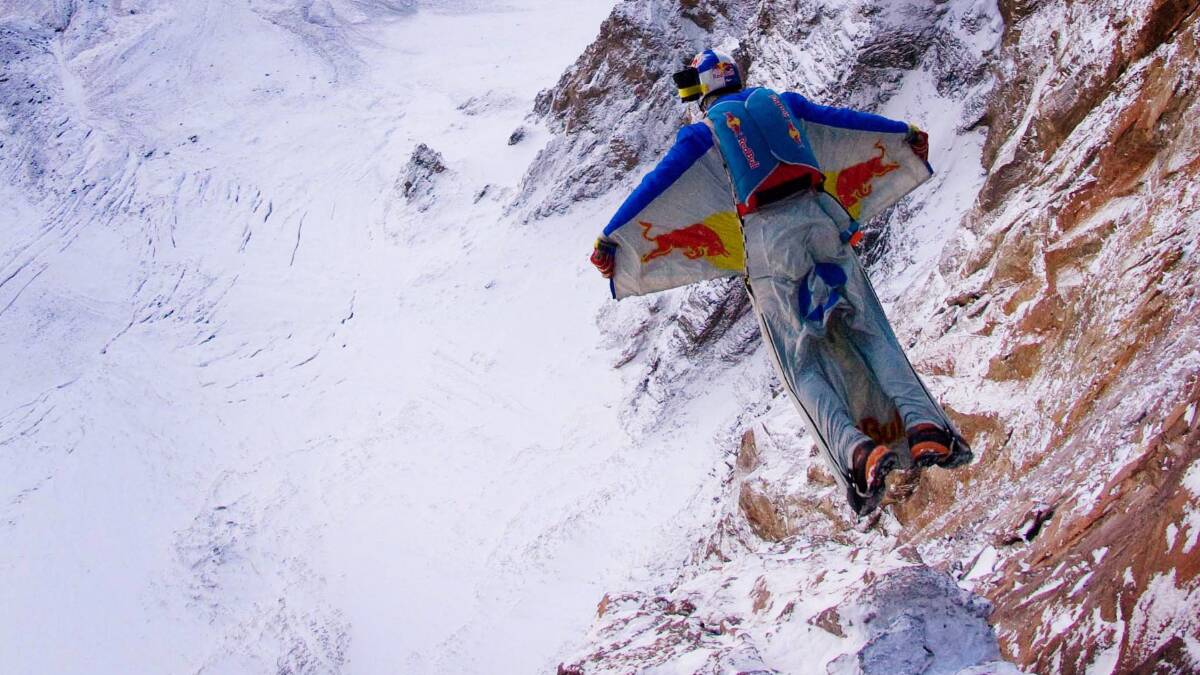 Russian extreme sport star Valery Rozov jumps off Europe's highest mountain, Mount Elbrus, wearing a wing-suit , on September 10, 2008 near Mineralnye Vody, Russia. The 43-year-old Russian spent two days climbing to the 4,600-meter summit of Kiukurtliu Cupola, part of Mt Elbrus, before breaking the record for Europe's highest jump with his one minute flight. Photo: Thomas Senf/Euro-Newsroom via Getty Images.